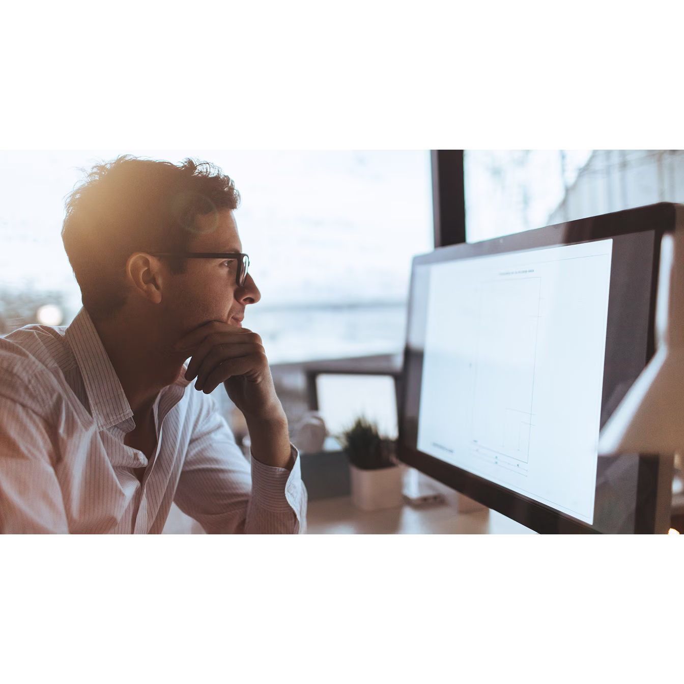 Compensation professional reviewing market data