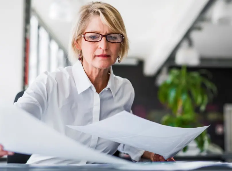 Compensation analyst reviewing salary survey data